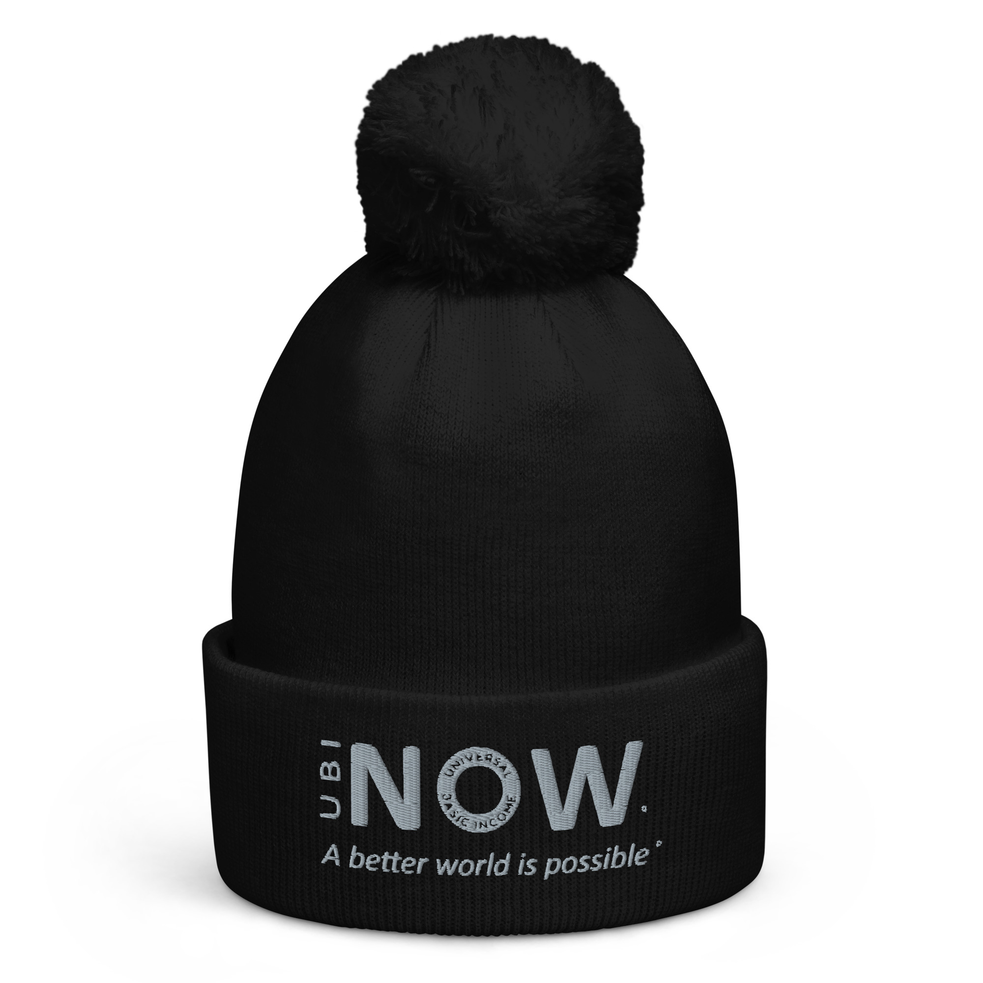 Schwarze Mütze mit Bommel und inspirierendem Spruch.